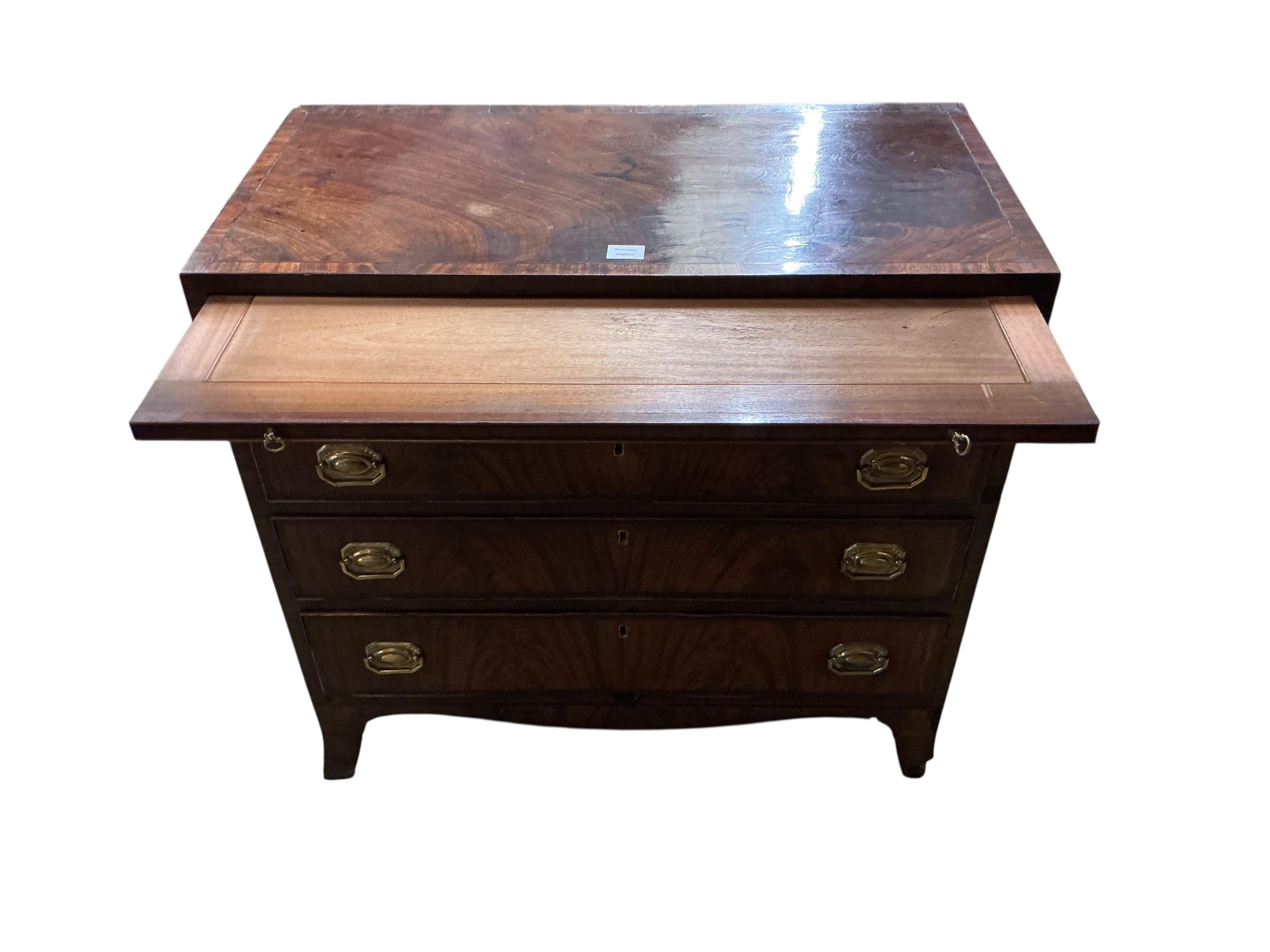 A Regency mahogany straight front chest, fitted four long graduated drawers, under a brushing slide, width 92cm, depth 47cm, height 88cm